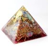 Gold-pinke Orgon Pyramide, 10cm. Orgonit Pyramide mit Heilsteinen und Metalle für Orgonenergie. Kraftvolle Energiepyramide.